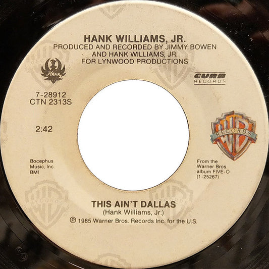 Hank Williams, Jr.* : This Ain't Dallas / I Really Like Girls (7", SRC)