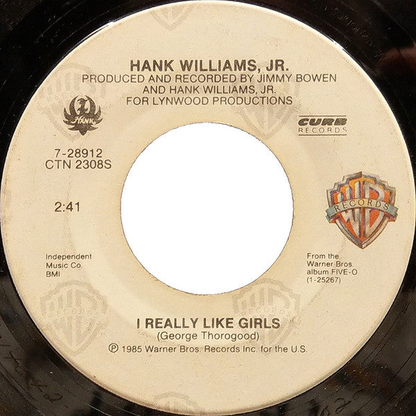 Hank Williams, Jr.* : This Ain't Dallas / I Really Like Girls (7", SRC)